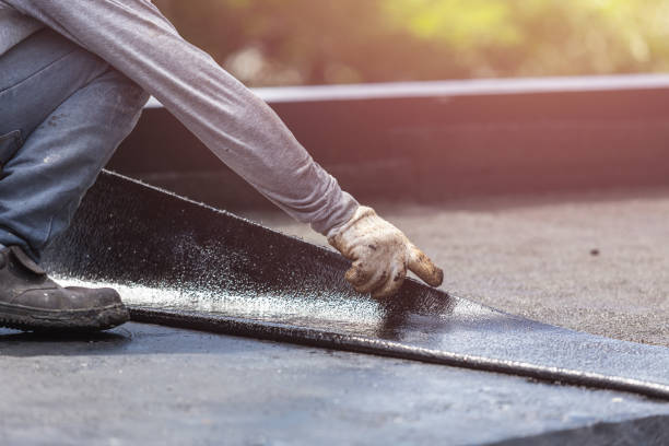 Professional Waterproofing technician working in East Aurora, NY